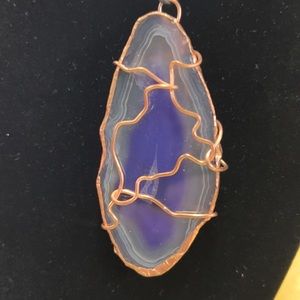 Handmade Amethyst geode and copper pendant. Can also be used to hang in a window